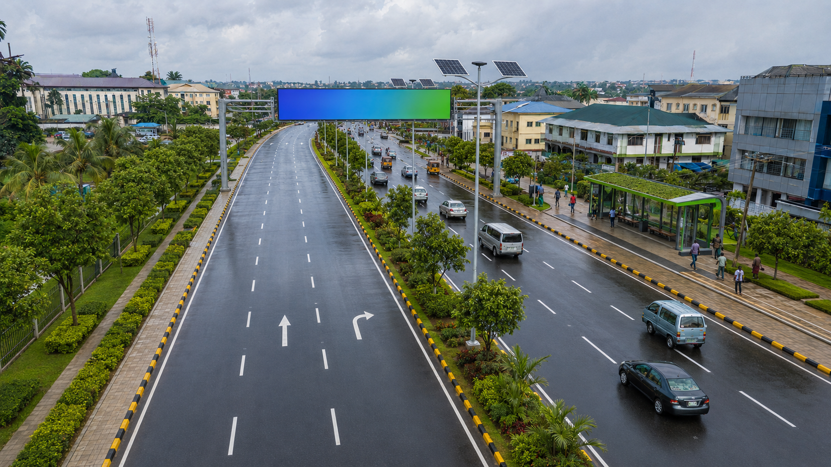 Concept visualisation of the Delta Green Gateway with marked traffic lanes, an overhead digital screen, landscaped verges, a green bus stop, pedestrian walkways and solar streetlights